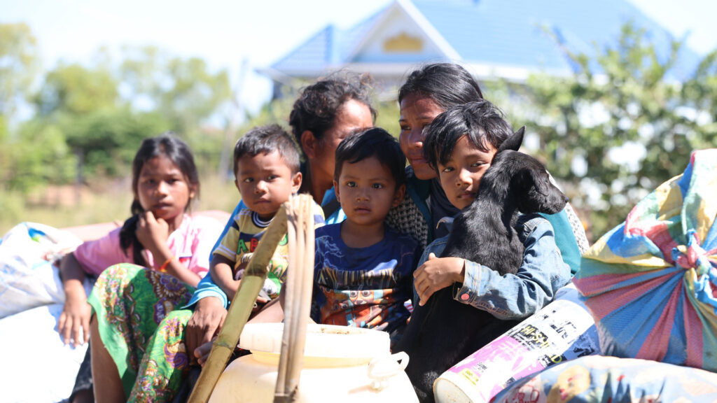 A Cambodian family flee the border clash